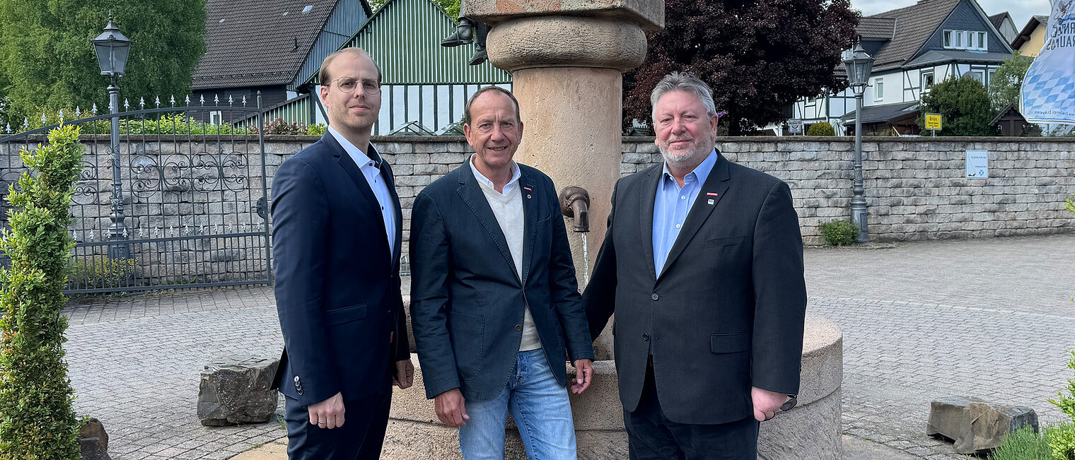 Ein Gruppenbild mit Fabian Bräutigam, Michael Neuhaus und Christian Will.