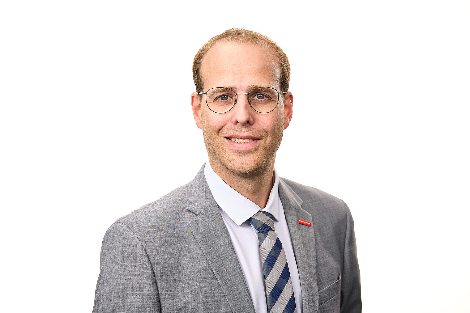 Porträtfoto von Fabian Bräutigam, stellvertretender Hauptgeschäftsführer der Handwerkskammer Südwestfalen.