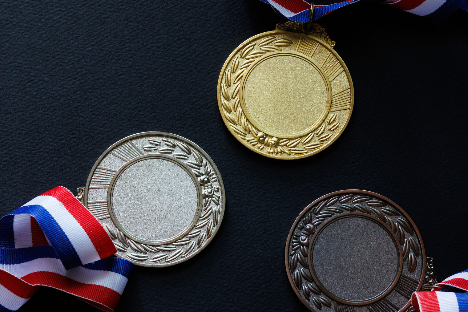 Nahaufnahme einer Gold-, Silber- und Bronzemedaille