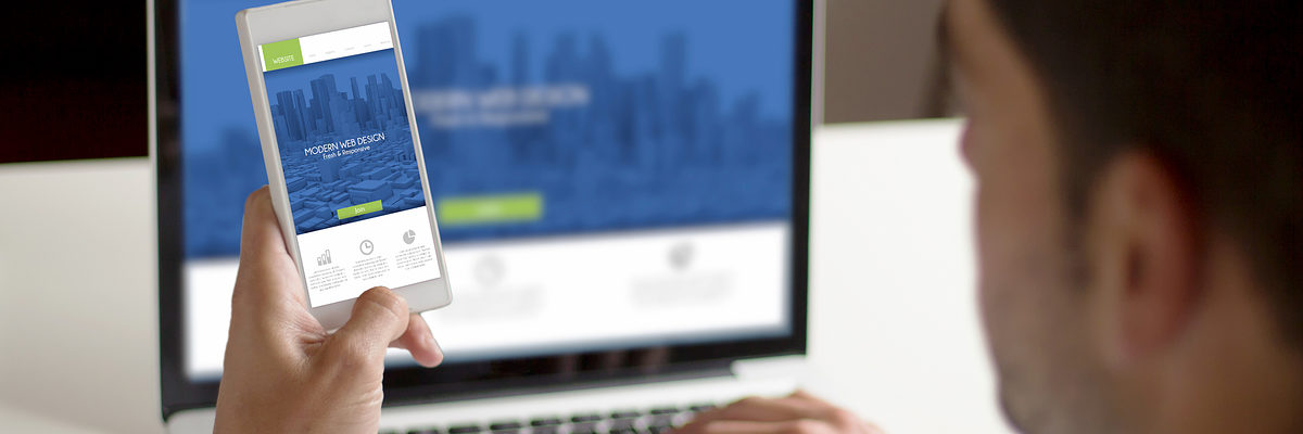 businessman testing responsive at work with smartphone showing website on screen. All screen graphics are made up. Schlagwort(e): Smart Phone, Web Page, Wireless Technology, Mail, Touch Screen, Businessman, Women, Men, Coding, Marketing, Single Object, Single Word, E-commerce, Inbox, Buying, Pushing, Holding, Mobility, Cooperation, Connection, Advice, Direction, Business, Technology, Manager, Financial Occupation, Liquid, Street, Internet, Laptop, Mobile Phone, Telephone, Equipment, b2b, likes, template, web design, webdesign, missed calls, Application Software, Business-to-business