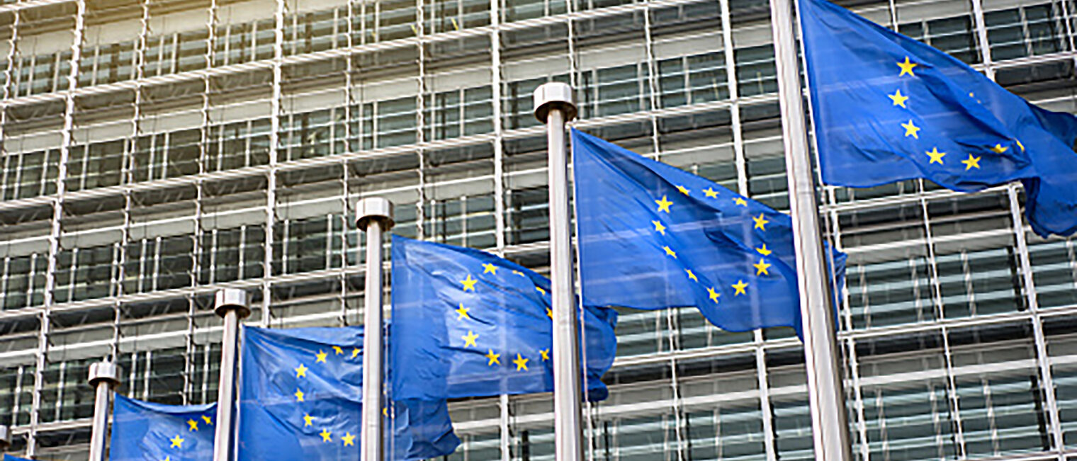 European Union flags in front of the Berlaymont